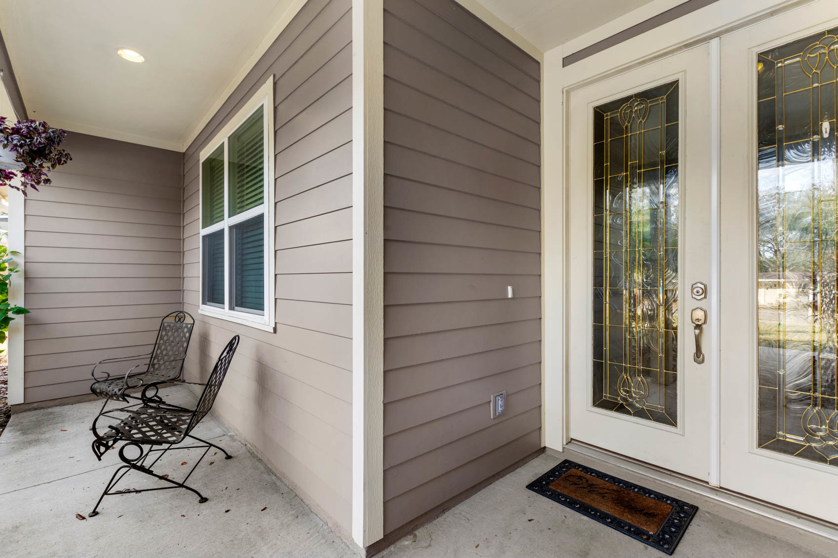 outside front door entrance with glass door